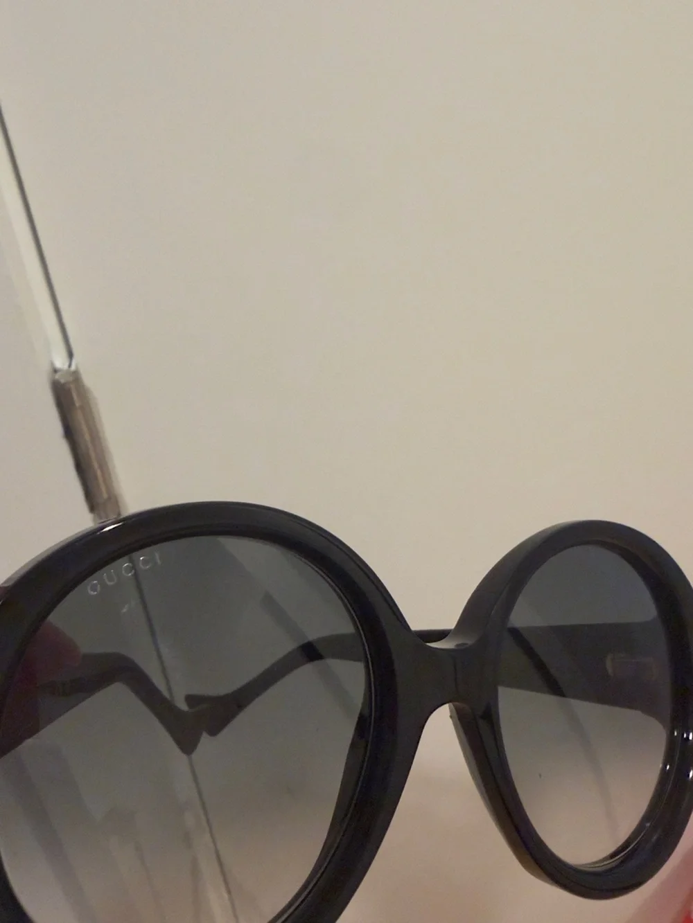 Gucci Black Round Sunglasses with Gold Logo Accent